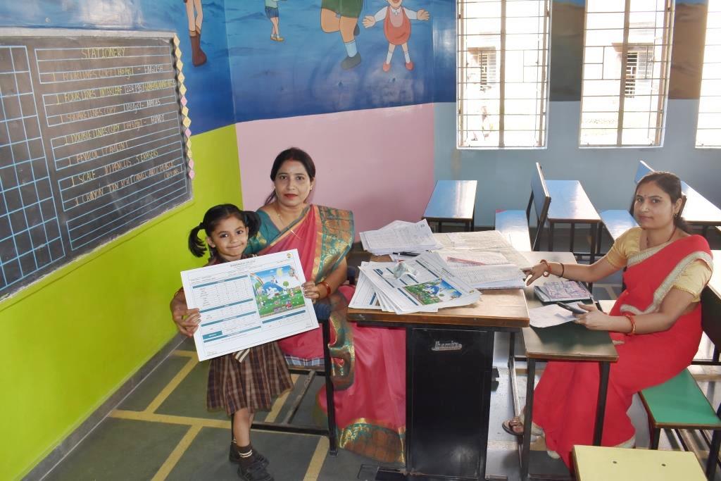 Report card distribution held on 27th March 2023
